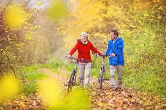 a couple riding bikes